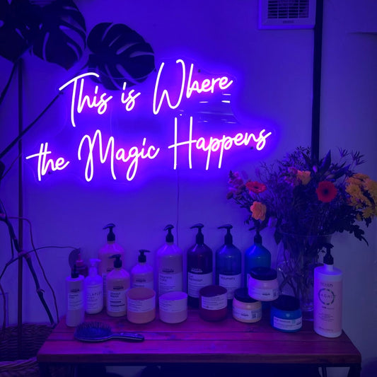 This is where the magic happens neon sign